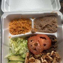 Las Tapatias - 2 meat plate. Meat was 3 ounces and cut into kibble sized pieces. Lettuce was filling most of the plate.
