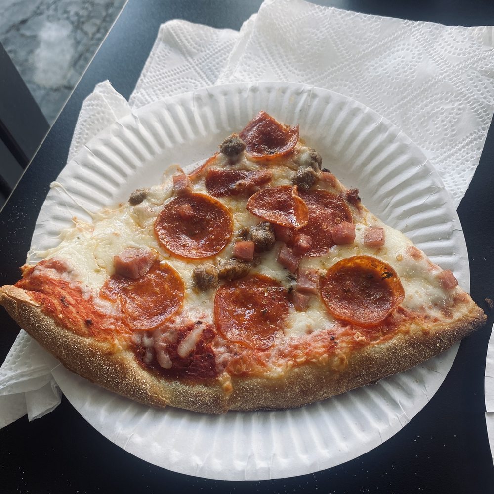 Pizza Local Venice - a slice of pepperoni pizza on a paper plate - Pizza Near Me - Los Angeles, California Pizza Local Venice - a slice of pepperoni pizza on a paper plate - Pizza Near Me - Los Angeles, California