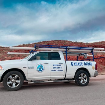A Plus Garage Doors - Work truck next to southern Utah's beautiful red rock - Garage Door Services Near Me - Cedar City, Utah A Plus Garage Doors - Work truck next to southern Utah's beautiful red rock - Garage Door Services Near Me - Cedar City, Utah