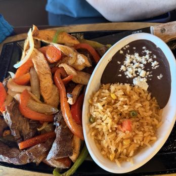 Frida’s Kitchen & Bar - Mixed fajitas - Mexican Near Me - Bryan, Texas Frida’s Kitchen & Bar - Mixed fajitas - Mexican Near Me - Bryan, Texas