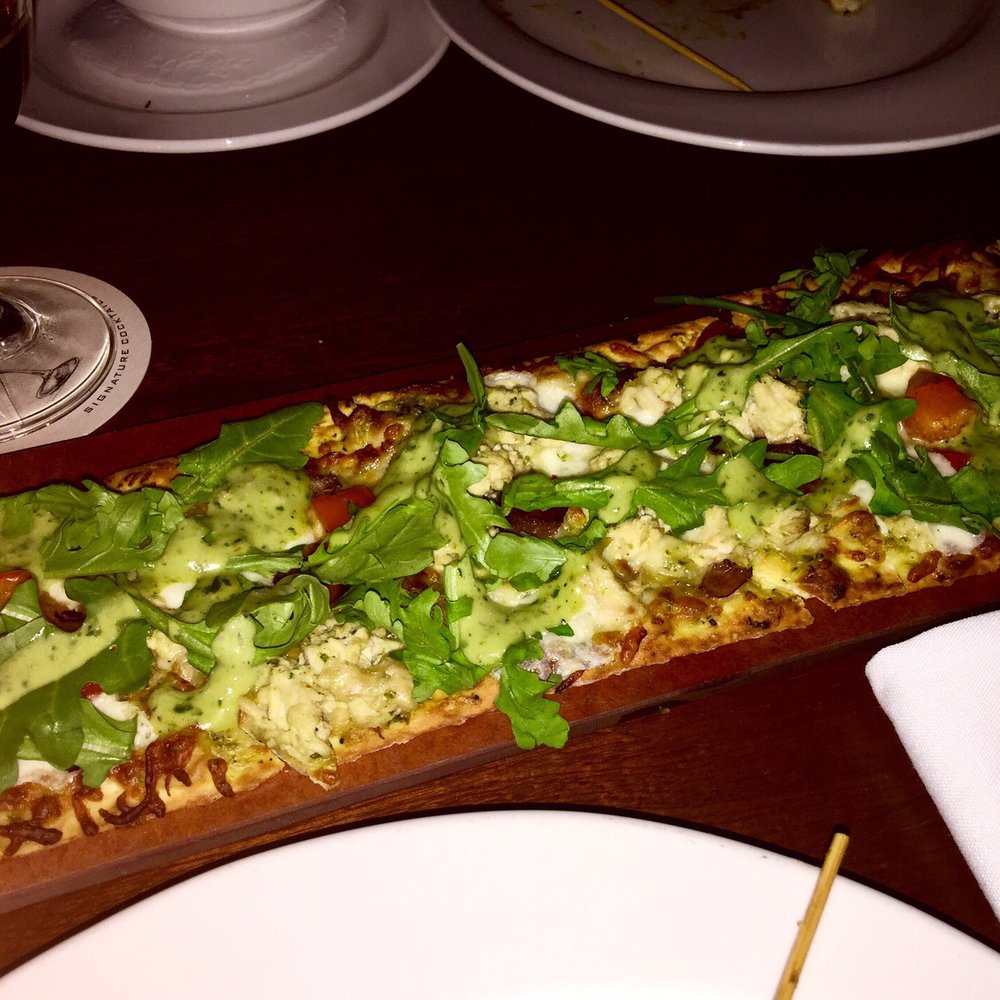 Seasons 52 - Garlic Chicken Flatbread. The sauce gave it quite a kick. - New American Near Me - Schaumburg, Illinois