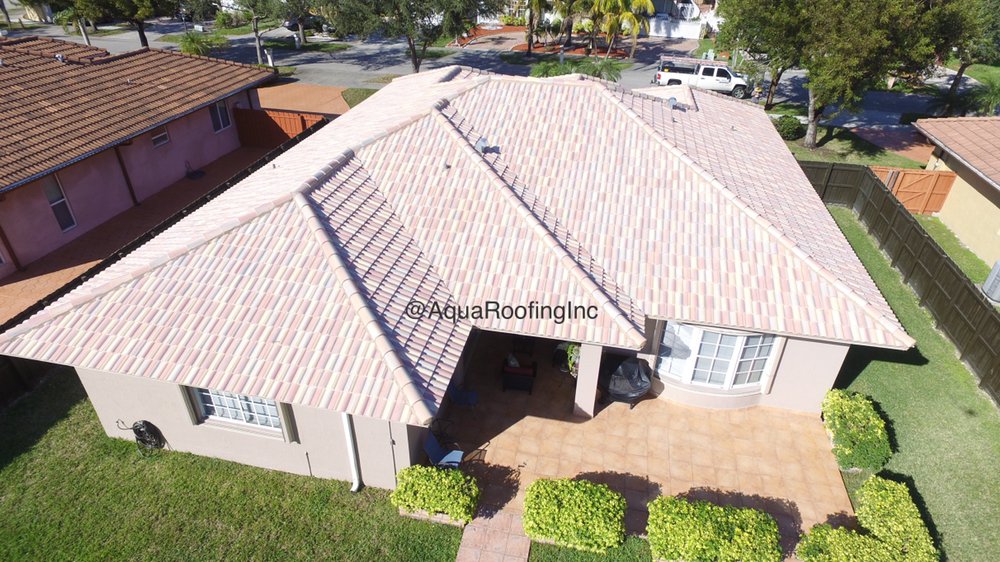 Slide of Aqua Roofing