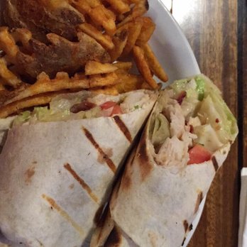 Hoppie's Landing - Honey mustard chicken wrap with waffle fries - Pizza Near Me - Pellston, Michigan Hoppie's Landing - Honey mustard chicken wrap with waffle fries - Pizza Near Me - Pellston, Michigan