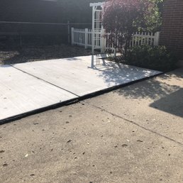 Notice how the existing driveway still dips at the seam line- should've been leveled the first time.