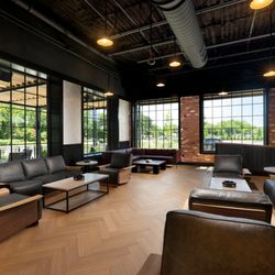 Holt's Cigar Company - Kick back in ultimate comfort. Our premium cigar lounge features plush couches and cozy chairs perfect for a relaxing smoke and drink.