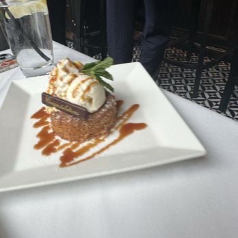 Del Frisco's Double Eagle Steakhouse - How sweet they brought this butter cake out to celebrate. - New American Near Me - Indianapolis, Indiana