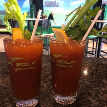 X Golf Carmel - two glasses of bloody drink - Sports Bars Near Me - Carmel, Indiana X Golf Carmel - two glasses of bloody drink - Sports Bars Near Me - Carmel, Indiana