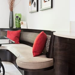 International Builders - We built a custom curving island and bench that became one seamless piece.