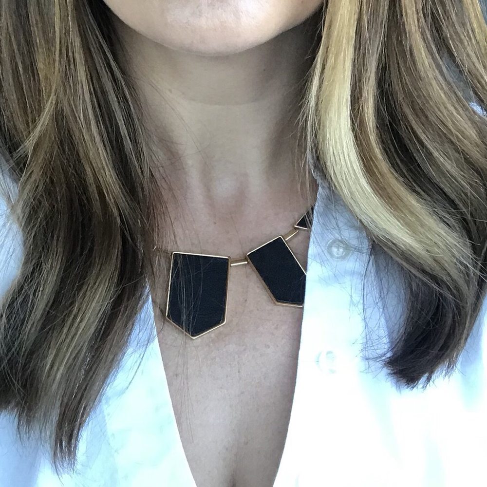 My uneven hair, AFTER I paid to get it colored and cut. You can see one side is clearly 1-2 inches longer than the other