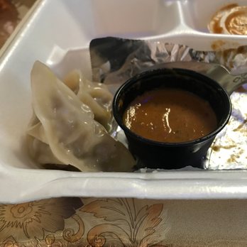 Desi Spice - Momos, you get 10 of them in an order..dipping tastes of charred vegetables and. Hilo and ginger. Not too hot. - Indian Near Me - Kentwood, Michigan