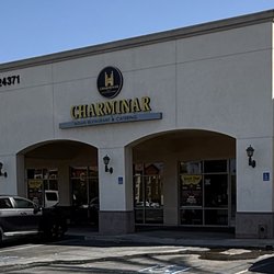 Charminar Indian Restaurant & Catering - Main entrance with puddle of water
