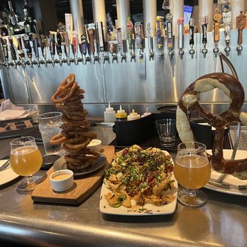 Yard House - Onion Ring Tower, Poke Nachos, Jumbo Bavarian Pretzel, Voodoo IPA - New American Near Me - San Jose, California Yard House - Onion Ring Tower, Poke Nachos, Jumbo Bavarian Pretzel, Voodoo IPA - New American Near Me - San Jose, California