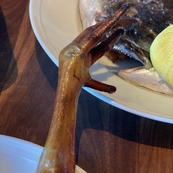 Angler - Whole roasted chicken with sea bream in background. You're right, that's just the foot, but isn't it gorgeous? - Seafood Near Me - San Francisco, California Angler - Whole roasted chicken with sea bream in background. You're right, that's just the foot, but isn't it gorgeous? - Seafood Near Me - San Francisco, California
