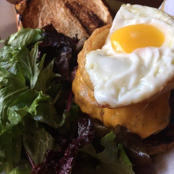Flying Pig Pub & Kitchen - My pork burger with egg on a pretzel bun and side salad - Pubs Near Me - Oceanside, California