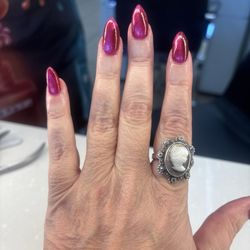 Sky Nails - This place is my jam! Beautifully updated comfortable salon. Reasonably priced. Love the cat eye selection. These are my natural nails btw!!
