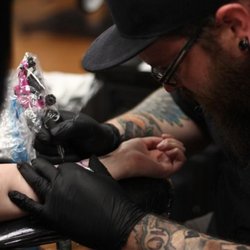 Unhinged Tattoos and Piercings