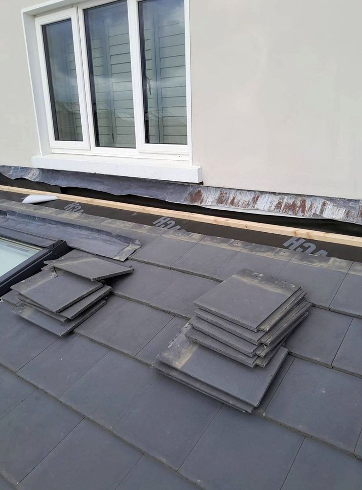 Slide of Tobin Hill Roofing