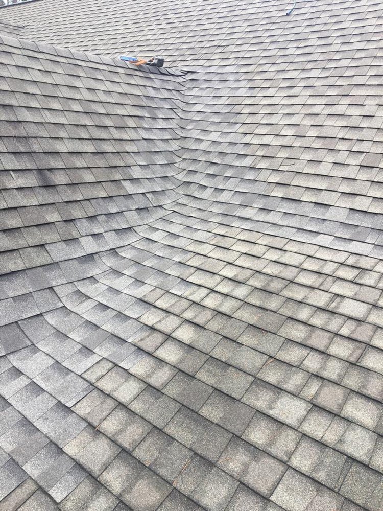 Slide of Rocco’s Roofing