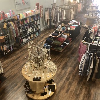 Classy To Sassy - View of our store and salon. Also, a sample of our beautiful handheld spray tans! - Tanning Near Me - Cullman, Alabama