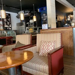 Union Park Coffee - Comfy chairs, view of baked goods and kitchen area