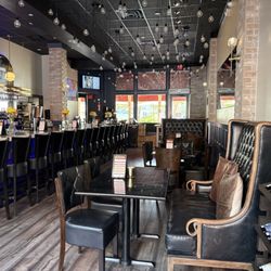 Imperium Food & Wine - Various seating and long bar area.
