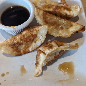 Bowl & Chopstix - a plate of dumplings with dipping sauce - Chinese Near Me - Allen, Texas Bowl & Chopstix - a plate of dumplings with dipping sauce - Chinese Near Me - Allen, Texas
