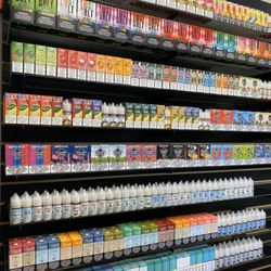 Speedys Smoke Shop - Famous vape juice wall