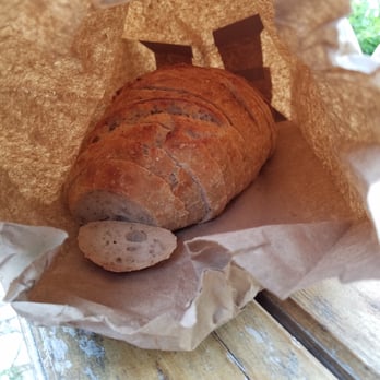 Community Loaves - Rosemary garlic sourdough bread, sliced. - Bakeries Near Me - Jacksonville, Florida Community Loaves - Rosemary garlic sourdough bread, sliced. - Bakeries Near Me - Jacksonville, Florida