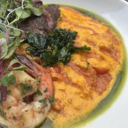 Summer Risotto with shrimp and skirt steak. Strong tomato flavor, needed salt. Shrimp and steak were spot on. Overall would order again.
