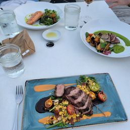 Clockwise from the top - salmon, tuna special, and steak. All the accompaniments were fresh and delicious Clockwise from the top - salmon, tuna special, and steak. All the accompaniments were fresh and delicious