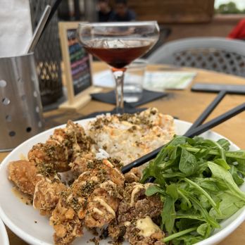 The Taproom at Old Town - a plate of food and a glass of wine - Beer Bar Near Me - Albuquerque, New Mexico The Taproom at Old Town - a plate of food and a glass of wine - Beer Bar Near Me - Albuquerque, New Mexico