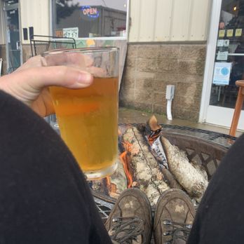 Hop Cycle Brewing - IPA by the fire, raining but under an umbrella - Brewpubs Near Me - Banks, Oregon