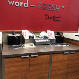 a sign on the wall of a fast food restaurant