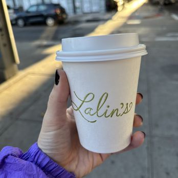Lalin's - a person holding a cup of coffee - Coffee & Tea Near Me - Brooklyn, New York Lalin's - a person holding a cup of coffee - Coffee & Tea Near Me - Brooklyn, New York