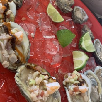 Mariscos El Pacifico - Oysters with shrimp ceviche on top. So good!! - Seafood Near Me - Jacksonville, Florida