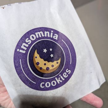 Insomnia Cookies - Insomnia cookie wrapper holding one cookie. - Desserts Near Me - Philadelphia, Pennsylvania Insomnia Cookies - Insomnia cookie wrapper holding one cookie. - Desserts Near Me - Philadelphia, Pennsylvania