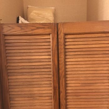 Hilton Chicago/Northbrook - Even the closet have the wooden swing doors from back in the 80's. - Hotels Near Me - Northbrook, Illinois