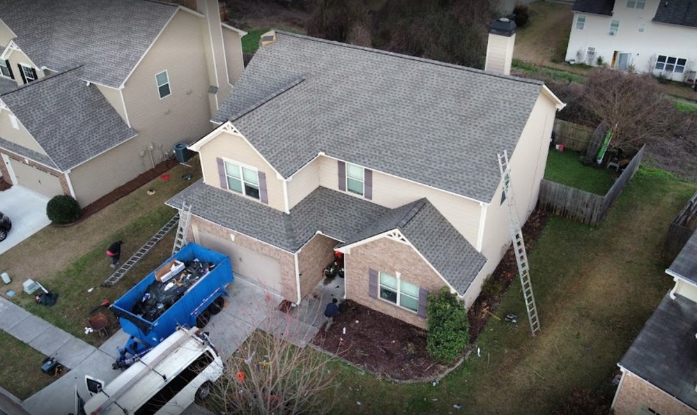 Slide of One Tree Roofing