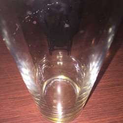 Main Street Pizza - Empty glass and no food.