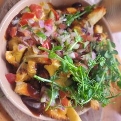 Rooted Cafe and Supper Rooms - Indian Poutine