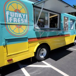 a food truck parked in a parking lot