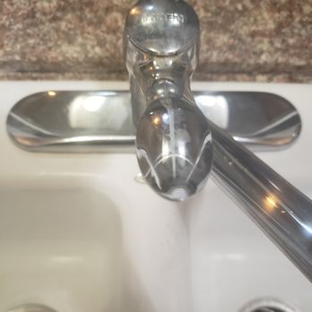 Residential Deep Cleaning - Kitchen sink faucet cleaned up and sparkly - Home Cleaning Near Me