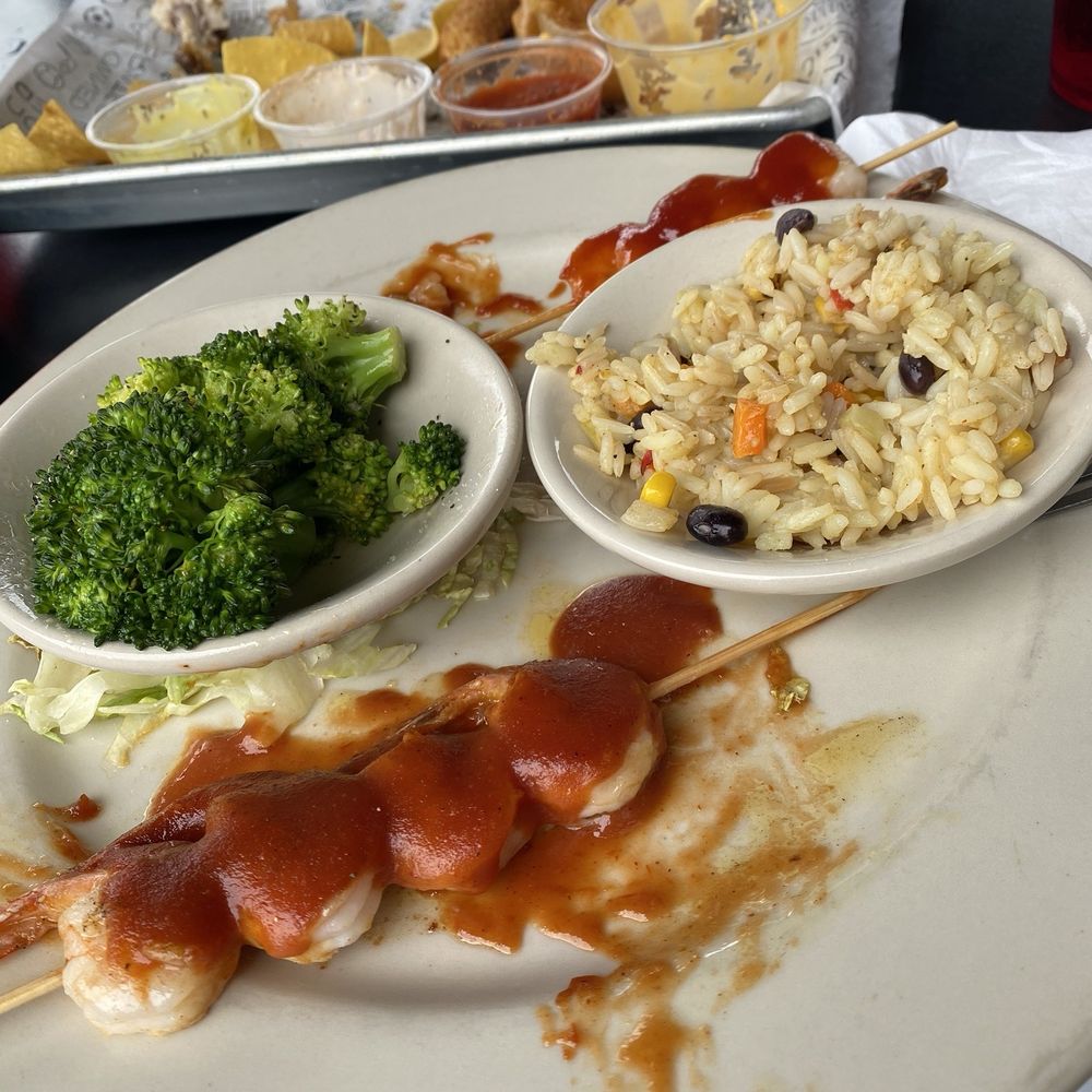 Chargrilled Shrimp Skewers with choice of sauce. Chargrilled Shrimp Skewers with choice of sauce.