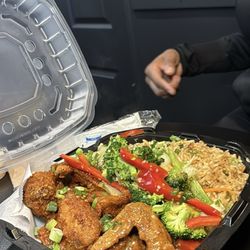 Korean fried chicken with fried rice and vegetables