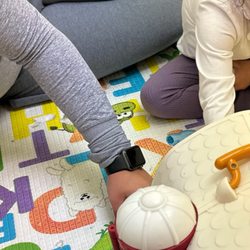 Innovative Therapy Services - My child, accompanied by a staff member, observe the wall, carpet mat, and toy. These items appear to be dirty and lack proper sanitation.