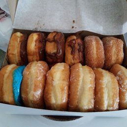 Dozen variety yeast donuts.
