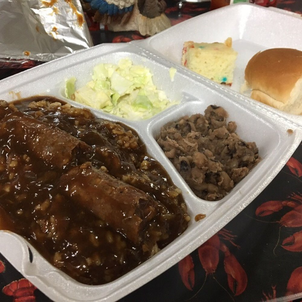 Suire's Grocery and Restaurant - Plate lunch of fresh homemade sausage and gravy over rice, black-eyed peas, cole slaw, roll, and cake - Cajun/Creole Near Me - Kaplan, Louisiana Suire's Grocery and Restaurant - Plate lunch of fresh homemade sausage and gravy over rice, black-eyed peas, cole slaw, roll, and cake - Cajun/Creole Near Me - Kaplan, Louisiana