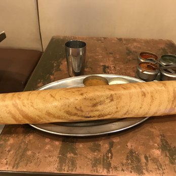 Dosa Delight - Spinach masala dosa with daal and coconut chutney (it's literally equal in length as the width of my table) - Indian Near Me - Jackson Heights, New York