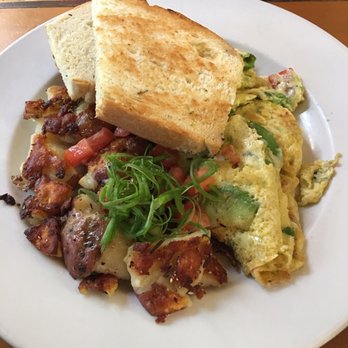 Orphan - Avocado scramble with potatoes and rosemary toast - Breakfast & Brunch Near Me - Sacramento, California Orphan - Avocado scramble with potatoes and rosemary toast - Breakfast & Brunch Near Me - Sacramento, California