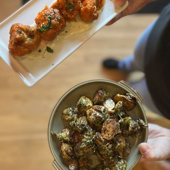 The Retreat Lake Wateree Dining - Staples on the menu: brussels bravas & buffalo cauliflower - Southern Near Me - Ridgeway, South Carolina The Retreat Lake Wateree Dining - Staples on the menu: brussels bravas & buffalo cauliflower - Southern Near Me - Ridgeway, South Carolina